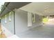 View of the covered porch of painted brick and concrete floors at 2107 Garden Cir, Decatur, GA 30032