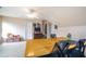 Large bonus room with multiple doors, a large table, and space for activities at 1997 Shaker Falls Ln, Lawrenceville, GA 30045
