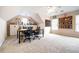 Spacious bonus room with ample storage, natural light, and room for multiple desks at 1997 Shaker Falls Ln, Lawrenceville, GA 30045