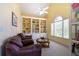 Cozy living area featuring built-in bookshelves, large windows, and comfortable seating at 1997 Shaker Falls Ln, Lawrenceville, GA 30045