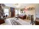 Cozy living room with a ceiling fan, a unique coffee table, and vintage industrial decor at 1997 Shaker Falls Ln, Lawrenceville, GA 30045