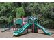 Community playground with slides and climbing structures, providing a fun and safe space for children to play at 1997 Shaker Falls Ln, Lawrenceville, GA 30045