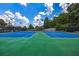 Well-maintained community tennis courts, offering residents an opportunity for recreation and exercise at 1997 Shaker Falls Ln, Lawrenceville, GA 30045