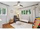 Bright Bedroom with hardwood floors, decoratively trimmed curtains, and tree views at 2481 Melinda Ne Dr, Atlanta, GA 30345