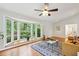 Inviting living room with beautiful bay windows and hardwood floors offering scenic backyard views at 2481 Melinda Ne Dr, Atlanta, GA 30345