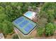 Aerial view of community pool and tennis courts surrounded by lush greenery in a desirable neighborhood at 4333 Collingham Ne Trce, Marietta, GA 30068
