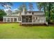 Beautiful backyard with a spacious deck, screened porch, and well maintained lawn at 4333 Collingham Ne Trce, Marietta, GA 30068