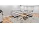 Cozy basement seating area with large gray couch and a coffee table at 4333 Collingham Ne Trce, Marietta, GA 30068