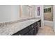 Bathroom features a granite countertop, dark cabinets and neutral paint at 4333 Collingham Ne Trce, Marietta, GA 30068