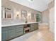 Bright bathroom with double vanity, tiled floors, a garden tub, and stylish wallpaper at 4333 Collingham Ne Trce, Marietta, GA 30068