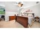Cozy bedroom with ceiling fan, carpet, and natural light at 4333 Collingham Ne Trce, Marietta, GA 30068