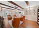 Relaxing living room showcasing a fireplace, beamed ceiling, and hardwood floors at 4333 Collingham Ne Trce, Marietta, GA 30068