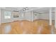 Open basement area with recessed lighting, wet bar and stylish flooring at 735 River Ridge Ln, Suwanee, GA 30024