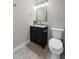 Cozy bathroom with granite countertop, modern vanity, and sleek fixtures at 735 River Ridge Ln, Suwanee, GA 30024