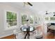 Charming breakfast nook featuring hardwood floors and seamlessly connected to the kitchen at 735 River Ridge Ln, Suwanee, GA 30024