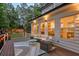 Inviting outdoor deck with seating and outdoor lighting at 735 River Ridge Ln, Suwanee, GA 30024