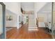 Grand two-story foyer with hardwood floors, staircase, and elegant architectural details at 735 River Ridge Ln, Suwanee, GA 30024