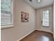Cozy entryway features wood flooring, access to the backyard, and a charming wall art at 747 Topsail Ln, Alpharetta, GA 30005