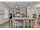 Modern kitchen with stainless steel appliances, granite countertops, and a breakfast bar with seating at 747 Topsail Ln, Alpharetta, GA 30005
