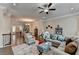 Comfortable living room featuring hardwood floors that flow into the kitchen area at 747 Topsail Ln, Alpharetta, GA 30005