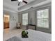 Main bedroom showcasing the carpet, paint, windows and doorway to the main bathroom at 747 Topsail Ln, Alpharetta, GA 30005