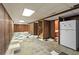 Basement featuring paneled walls and black and white tiled floors at 900 Fleetwood Cir, Atlanta, GA 30311