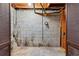 Unfinished basement showing cement block wall and open ceiling at 900 Fleetwood Cir, Atlanta, GA 30311