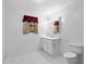 Well lit bathroom featuring a vanity with a large mirror at 900 Fleetwood Cir, Atlanta, GA 30311