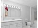 Bathroom featuring a bathtub, toilet, and vanity at 900 Fleetwood Cir, Atlanta, GA 30311