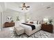 Stylishly decorated bedroom with a modern design, featuring a king-size bed and coordinated furnishings at 10645 Tuxford Dr, Alpharetta, GA 30022