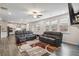 Open living room with modern rug and view into the modern kitchen space at 1504 Lemon Balm Ct, Lawrenceville, GA 30045