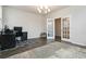 Office space featuring a computer setup, french doors, and modern decor at 1504 Lemon Balm Ct, Lawrenceville, GA 30045