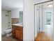 Bathroom with tiled walls, and a vanity with a mirror and a shower-tub combo at 2870 Pharr Court South Nw # 1704, Atlanta, GA 30305