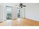 Bright bedroom with large windows offering city views and hardwood flooring at 2870 Pharr Court South Nw # 1704, Atlanta, GA 30305