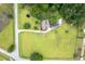 Overhead view of a home on a large lot showcasing lush greenery, and ample space at 4067 Mason Creek Rd, Winston, GA 30187