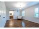 Bedroom featuring a barn door leading to an ensuite bathroom and a seating area near the window at 4067 Mason Creek Rd, Winston, GA 30187
