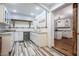 Kitchenette with white cabinets, shelving, and beverage center at 4067 Mason Creek Rd, Winston, GA 30187