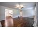 Spacious living room featuring hardwood floors and ceiling fan at 4067 Mason Creek Rd, Winston, GA 30187