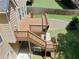 An elevated wooden deck featuring stairs and railings, offering an outdoor living space at 4895 Smokestone Dr, Douglasville, GA 30135