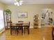 Cozy dining room with wood floors, adjacent to the staircase, creating an inviting atmosphere at 4895 Smokestone Dr, Douglasville, GA 30135