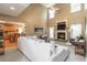 Open living room features high ceilings, a fireplace, and seamless access to the kitchen at 4895 Smokestone Dr, Douglasville, GA 30135