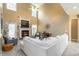 Inviting living room with high ceilings, fireplace, and a comfortable seating arrangement at 4895 Smokestone Dr, Douglasville, GA 30135
