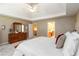Spacious main bedroom boasts tray ceiling, plush carpet and ensuite bathroom at 4895 Smokestone Dr, Douglasville, GA 30135