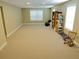 Spacious recreation room with ample space for creating your favorite hobby area at 4895 Smokestone Dr, Douglasville, GA 30135