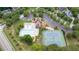 An aerial view of the community amenities including the pool, playground, and tennis courts at 1634 Crittenden Ln, Lawrenceville, GA 30043