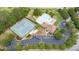 Community amenities featuring a swimming pool, tennis courts, clubhouse, and playground at 1634 Crittenden Ln, Lawrenceville, GA 30043