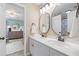 Dual vanity bathroom with modern sinks and decorative mirrors at 1634 Crittenden Ln, Lawrenceville, GA 30043