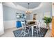 Elegant dining room with a modern chandelier and ample natural light at 1634 Crittenden Ln, Lawrenceville, GA 30043