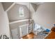 Bright foyer featuring a grand chandelier, hardwood floors, and an inviting double-door entrance at 1634 Crittenden Ln, Lawrenceville, GA 30043