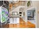 Inviting foyer showcasing hardwood floors, a staircase, and an open floor plan at 1634 Crittenden Ln, Lawrenceville, GA 30043